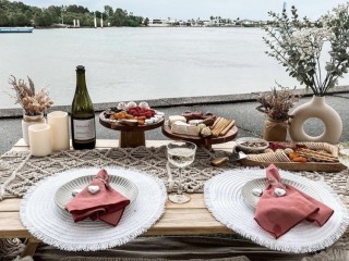 Beige and White boho picnic set up