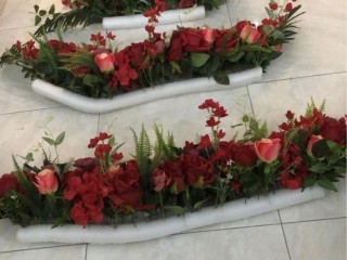 Red artificial flowers