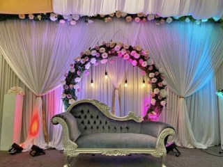 Weeding sofa with floral garlands