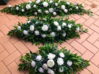 Floral arbour , welcome sign , back drop flowers .Event decorations , table Centrepiece.