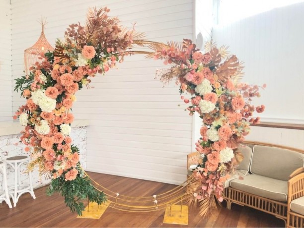 gold-orange-floral-arbour-floral-backdrop-wedding-ceremony-big-1