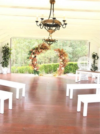 gold-orange-floral-arbour-floral-backdrop-wedding-ceremony-big-2