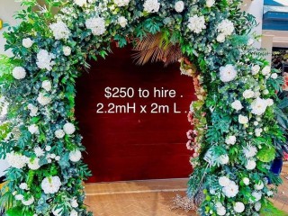 Greenery mix white floral arbour in U shape . Wedding arbour . Greenery backdrop .