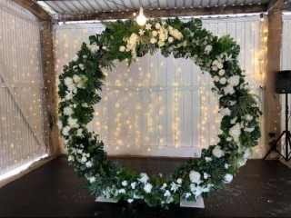 Wedding decorations . Greenery circle arch .