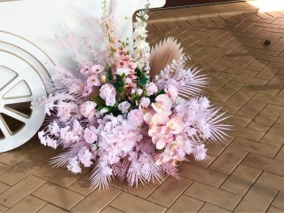 Artificial pink flower decorations , event hire .