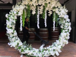 White flower circle arch . Wedding ceremony .