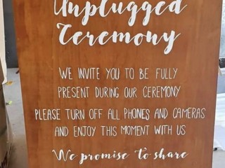 Unplugged sign for Hire with easel