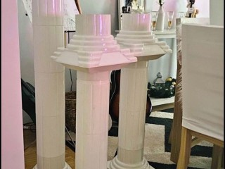 4 Roman pillars with 4 flowers in planters for HIRE